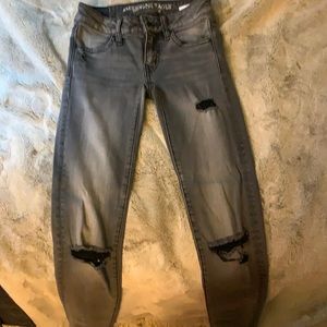 Gray wash, knee slit, low rise skinny jeans